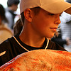 Kid with fish thunb nail.
