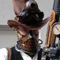 Steampunk atire with steampunk gun